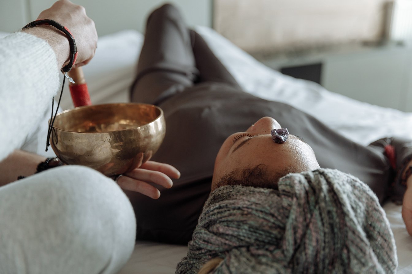 A Person using a Tibetan Singing Bowl